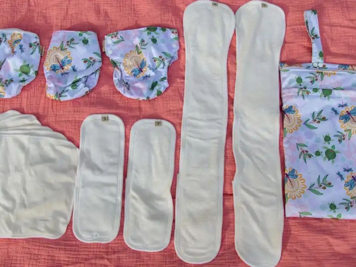 reusable cloth nappies laid out on table